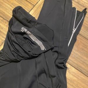 VS Sport black leggings. Size large. With ankle zipper.